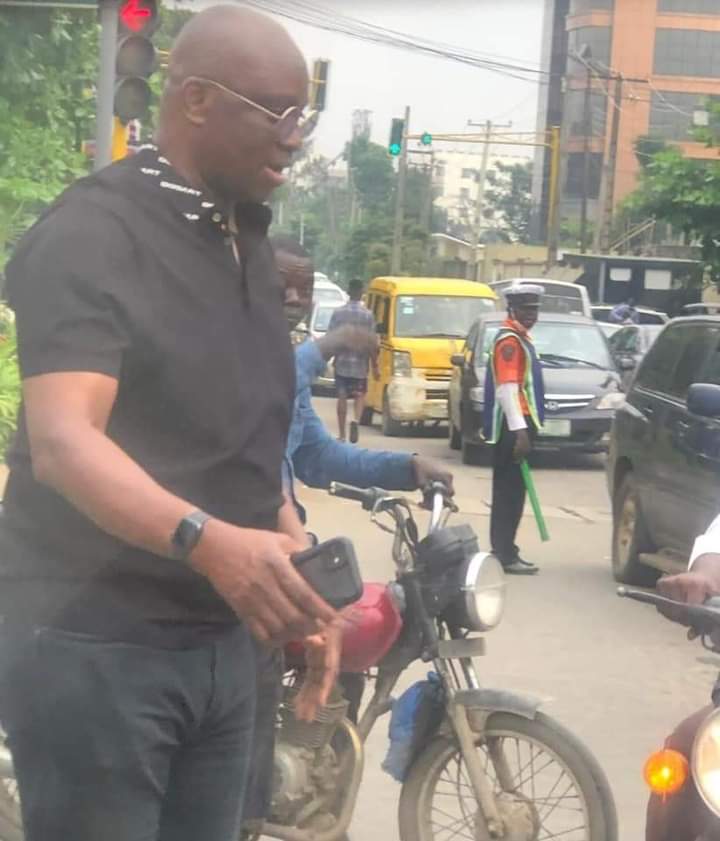 PHOTOS: Former Governor Fayose Rides on 'Okada' in Lagos Traffic