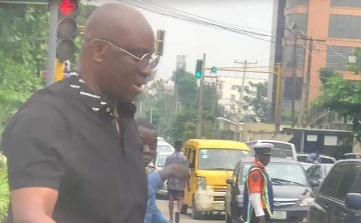 PHOTOS: Former Governor Fayose Rides on 'Okada' in Lagos Traffic