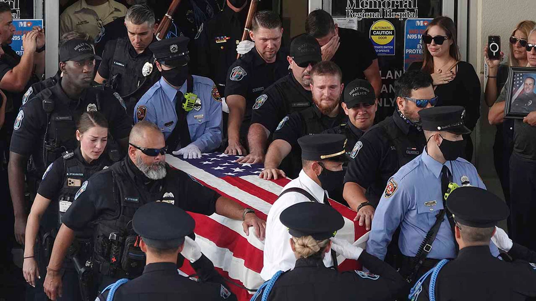 Tears Flow as Florida Police Officer Allegedly Killed by Teenager is Buried