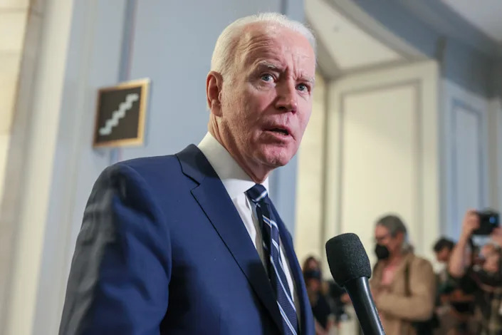 President Biden with a microphone in front of him.