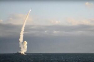 Handout photo released by Russian Defense Ministry Press Service on Monday, Oct. 31, 2022, shows a Russian warship launching a cruise missile at a target in Ukraine