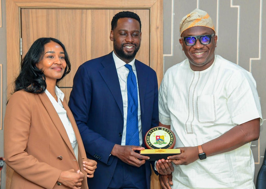 Lagos Commissioner for Economic Planning and Budget, Mr. Sam Egube, presenting a plaque to the World Economic Forum (WEF) delegation