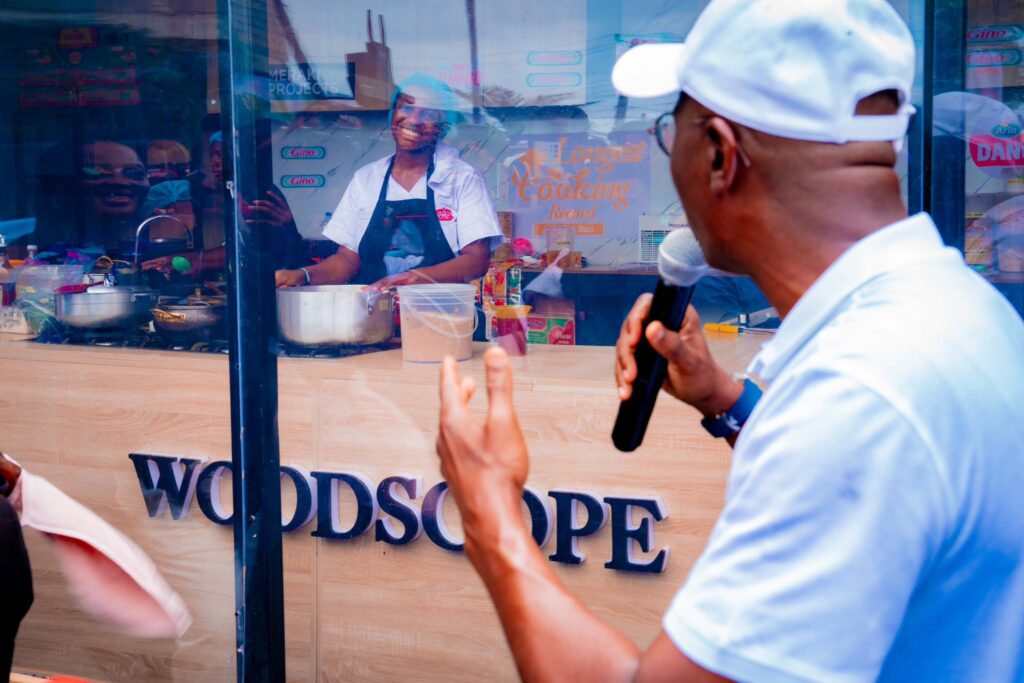 Governor Babajide Sanwo-Olu of Lagos State gives a thumb up to Hilda Baci as she attempts to set a new World Record for cooking
