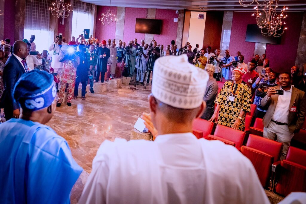 President Muhammadu Buhari and President-elect Bola Tinubu at the Press Gallery of the Presidential Villa