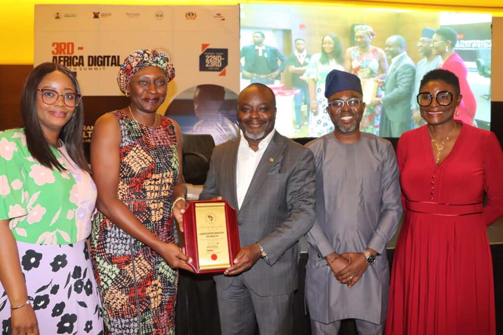 The organisers of the Africa Digital Health Summit present an award of recognition to the Lagos State Ministry of Health