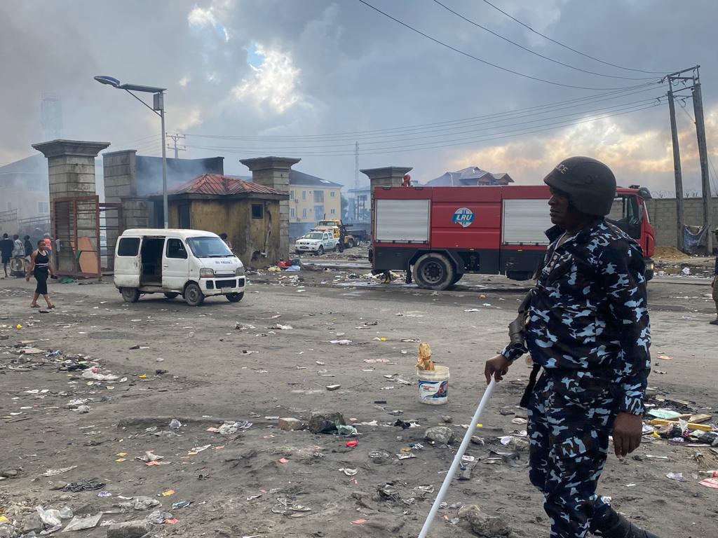 A Lagos Environmental Task Force officer at the Lekki Coastal Road as the unit cleaned up shanties in the area on Monday, June 27, 2023