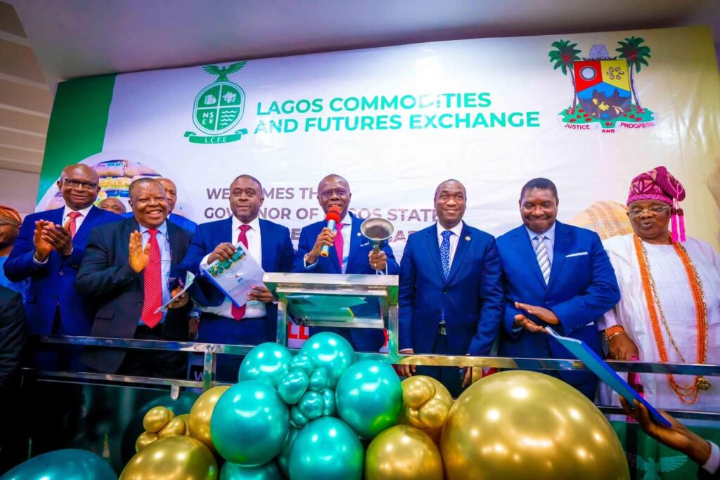 Lagos State Governor, Babajide Sanwo-Olu, rings a bell to signal the launch of the Five Billion Series 1 of the Eko Rice Contracts Programme on the Lagos Commodities and Futures Exchange