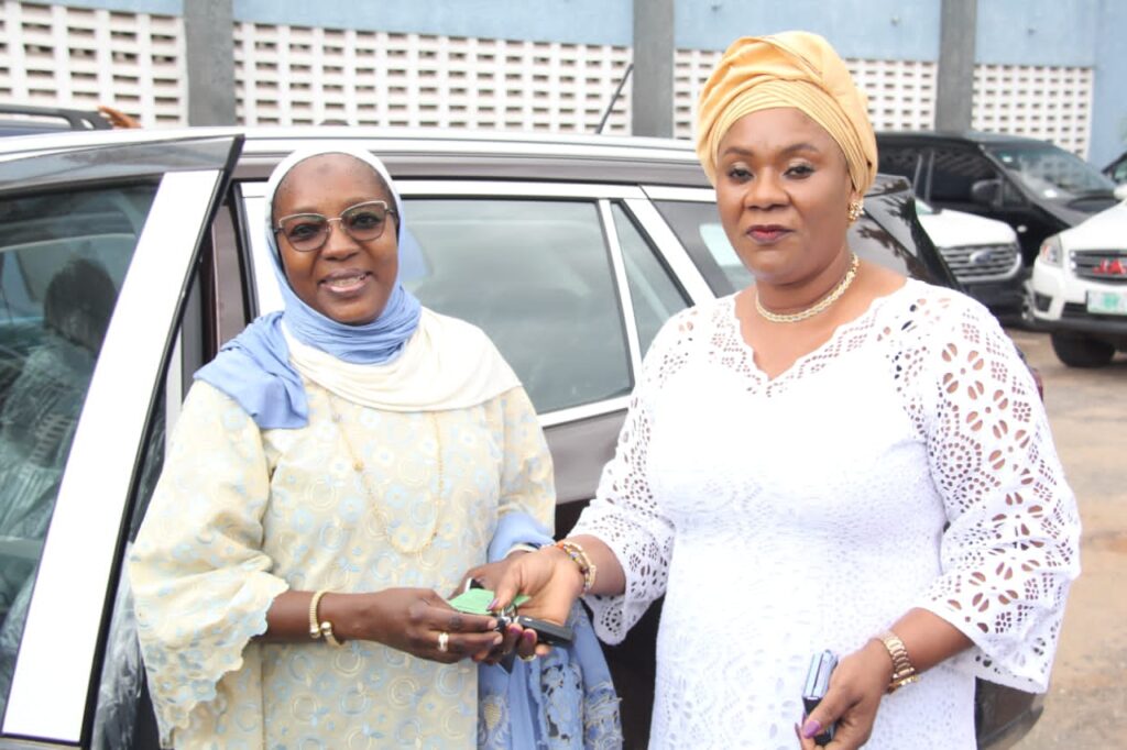 One of the permanent secretaries get the key to her new official vehicle