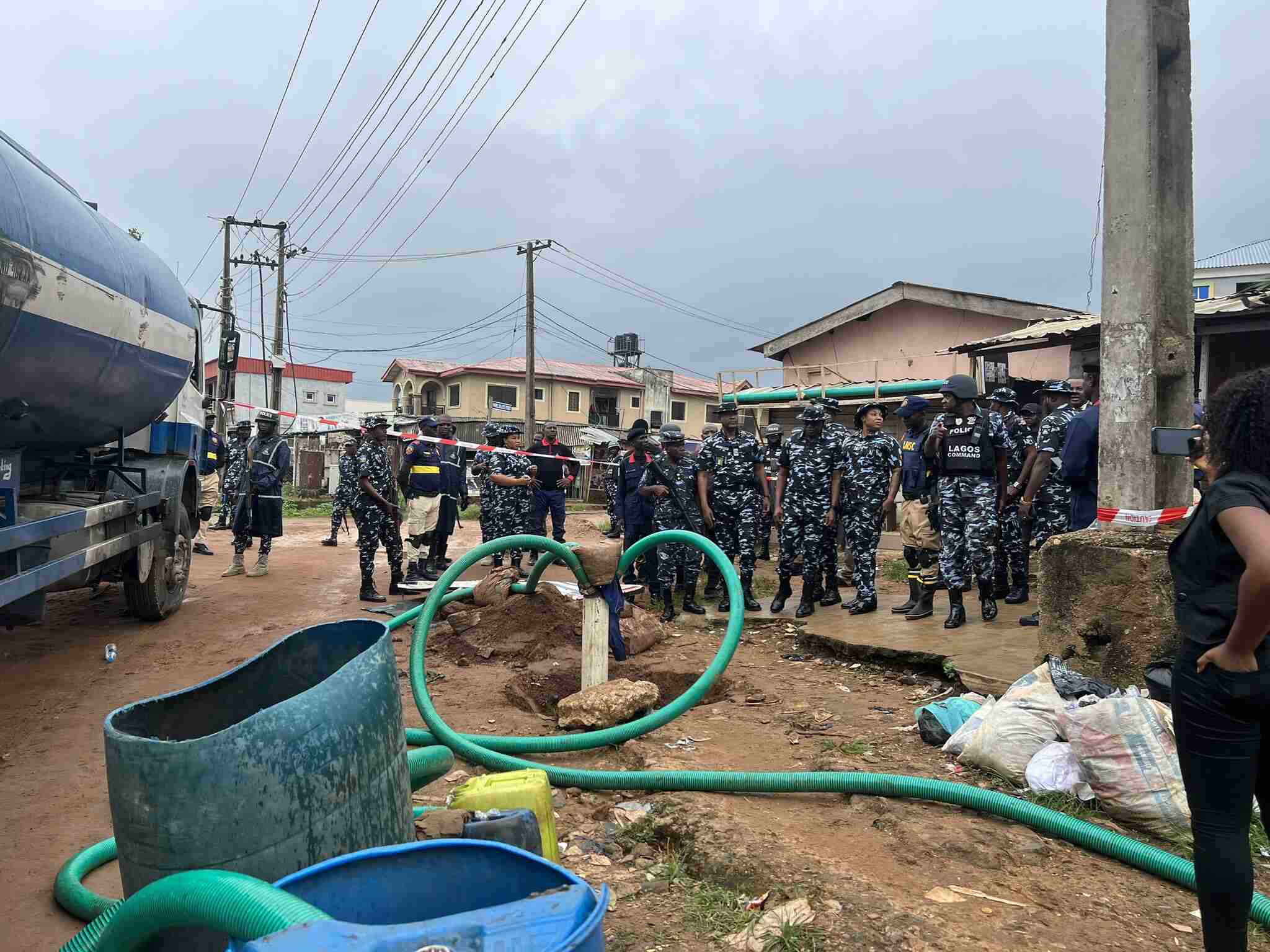 Police officers at the scene of the oil theft attempt in Idimu, Lagos