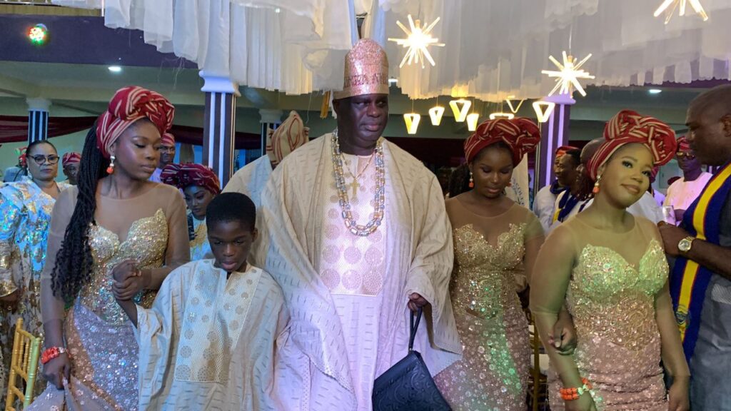 Otunba Atunluse of Egboroland, Funmi Abiodun-Findo, with his daughters and son at the reception celebrating his title conferment