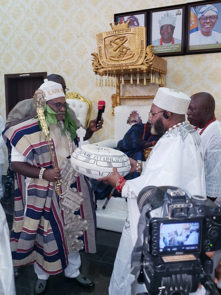 Aare Atunloto of Ilara Kingdom, Wendell De Landro, receiving his chieftaincy gift at his conferment ceremony