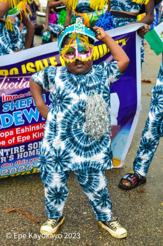 A boy joins the Epe carnival procession