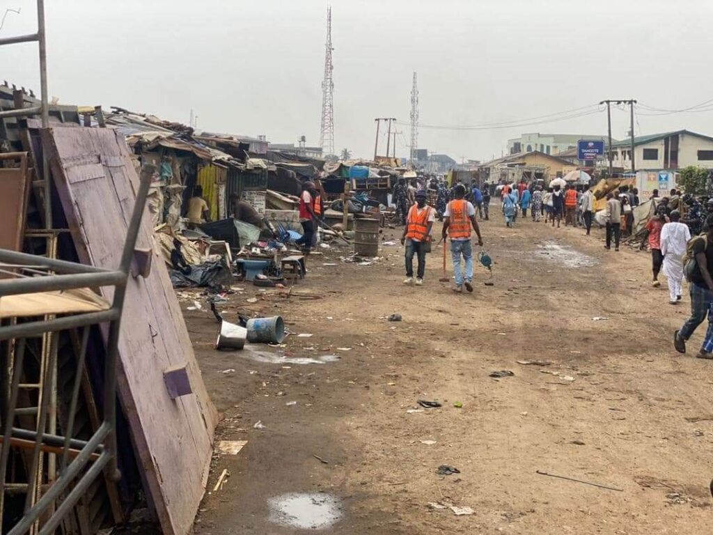 Lagos State Task Force members clearing the Fagba rail tracks of Shanties