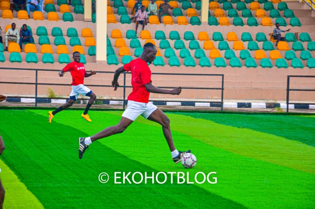 An Epe Ogunmodede Club player flies away with the ball in the novelty match