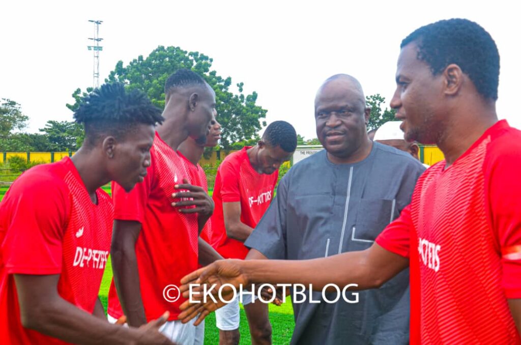 Former Epe LG Chairman, Hon. Segun Muhammad Agbaje, greets Epe Ogunmodede Club players at the novelty match