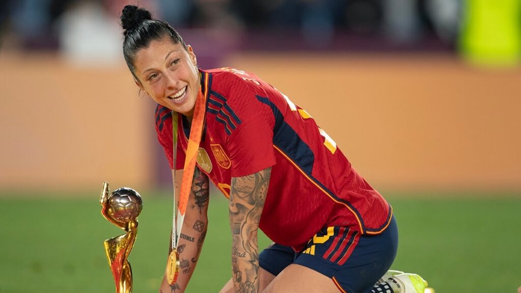 Spain's football star Jenni Hermoso poses with the World Cup trophy