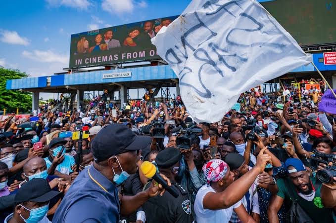 Lagos State Governor, Mr. Babajide Sanwo-Olu, standing with Nigerian youths against police brutality in 2020