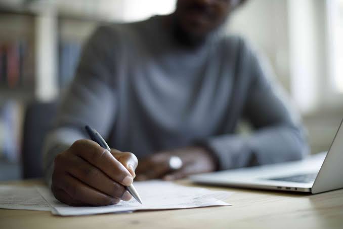 File photo of a man who is writing