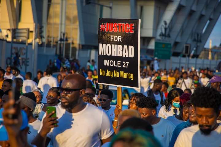 Nigerians at a candle light procession for MohBad