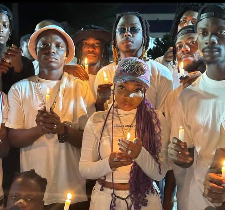 Nigerians at a candle light procession for MohBad