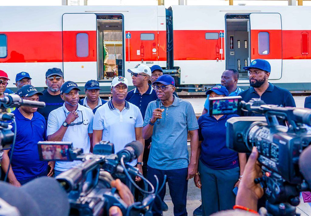 Lagos State Governor, Babajide Sanwo-Olu, speaking with journalists after leading some members of the state executive committee on a tour of the Red Line rail project at the Agege Station, Lagos
