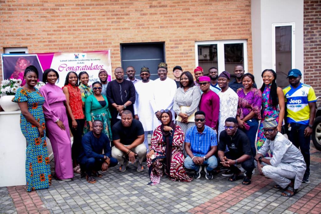 Lagos State Head of Service, Mr. Hakeem Muri-Okunola, and youths at Lateef Jakande Academy