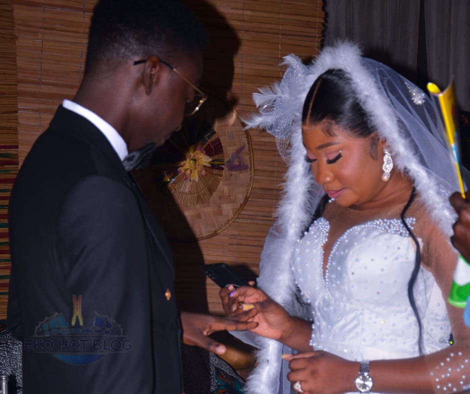 The couple, Ayoyemi Oluwakemi and Taiwo Adebola, exchange their marital rings