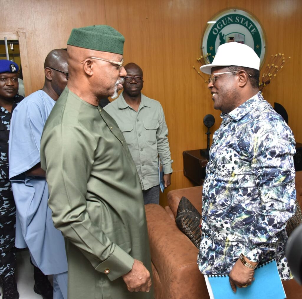 L-R: Governor Dapo Abiodun of Ogun State having a discussion with Minister of Works, David Umahi on Nigeria roads.