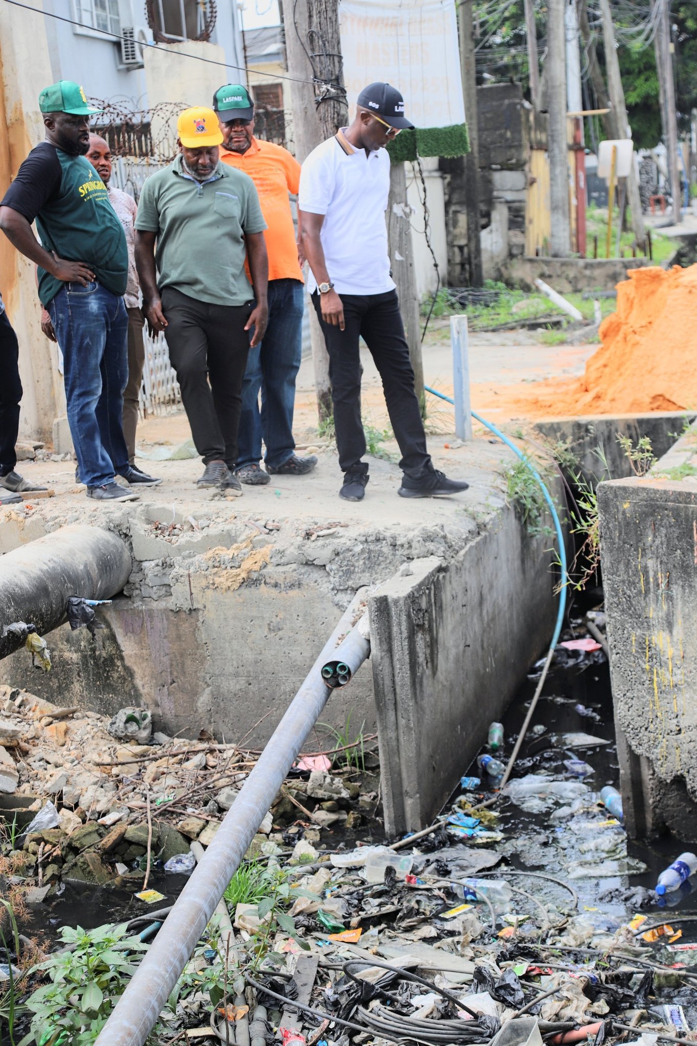 Lagos State Commissioner for the Environment and Water Resources, Tokunbo Wahab, and his team inspecting a drainage alignment 