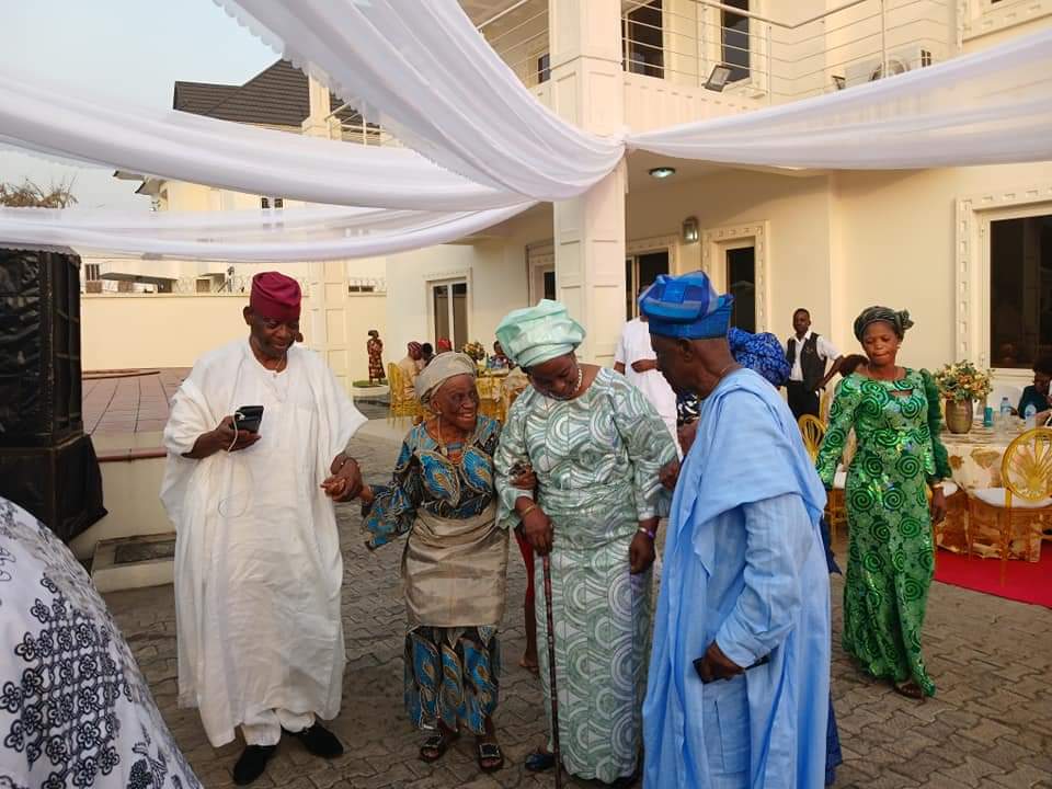 Bashorun JK Randle (in Blue Attire) and family and friends, including Otunba TJ Abass dancing at the reception in honour of his late father Chief JK Randle