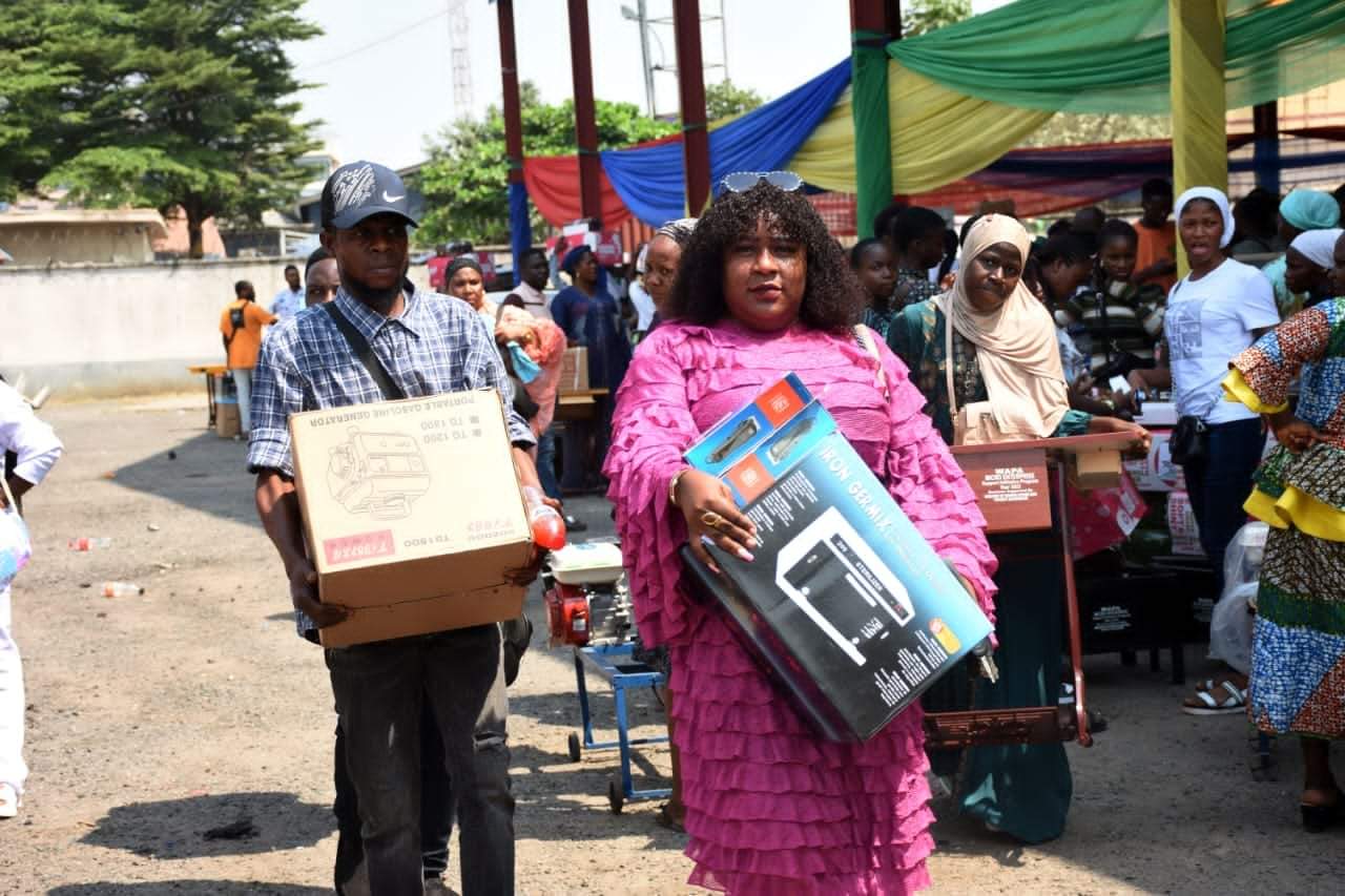 Some of the 1,000 beneficiaries of the Micro Enterprise Support Initiative presented with empowerment tools