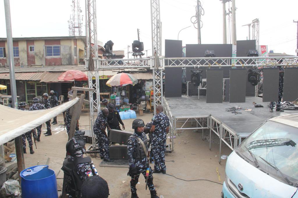 Police officers surround the venue of planned street carnival in Shasha, Akowonjo, Lagos 