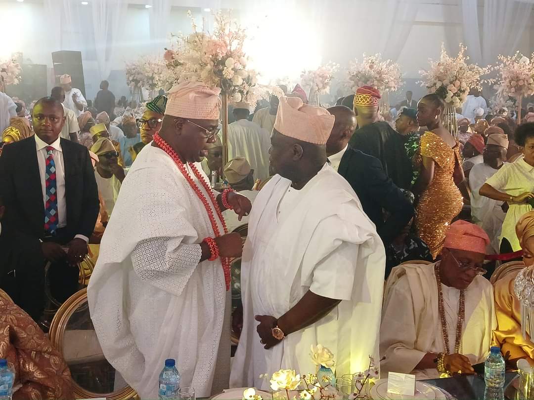 Alara of Ilara, Oba Olufolarin Olukayode Ogunsanwo and former Governor of Lagos State, Akinwunmi Ambode at the wedding ceremony