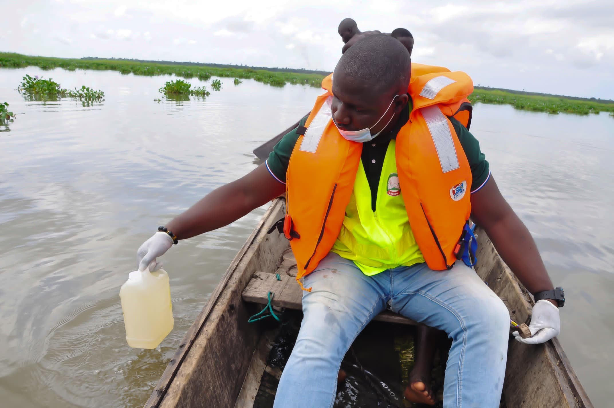 LASEPA officials taking water samples to investigate the Epe fish deaths