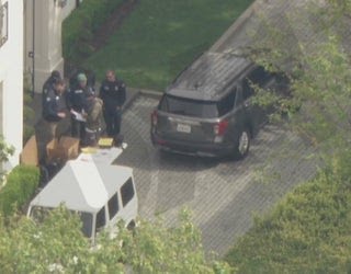 Aerials of US law enforcement agents at Sean "Diddy" Combs' LA home during raid on March 25, 2024. (Photo: Fox LA)