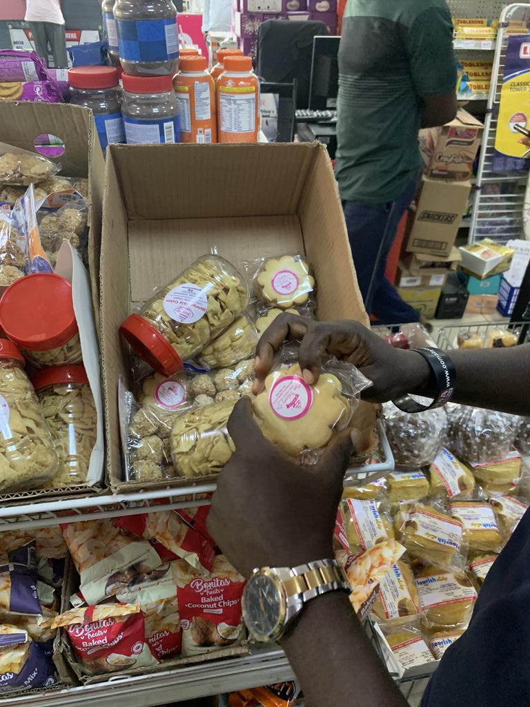 LASCOPA officials inspecting products' price tags at a Lagos supermarket