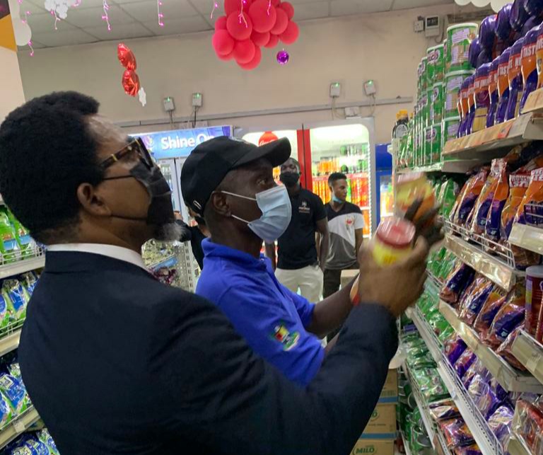 LASCOPA officials inspecting products' price tags at a Lagos supermarket