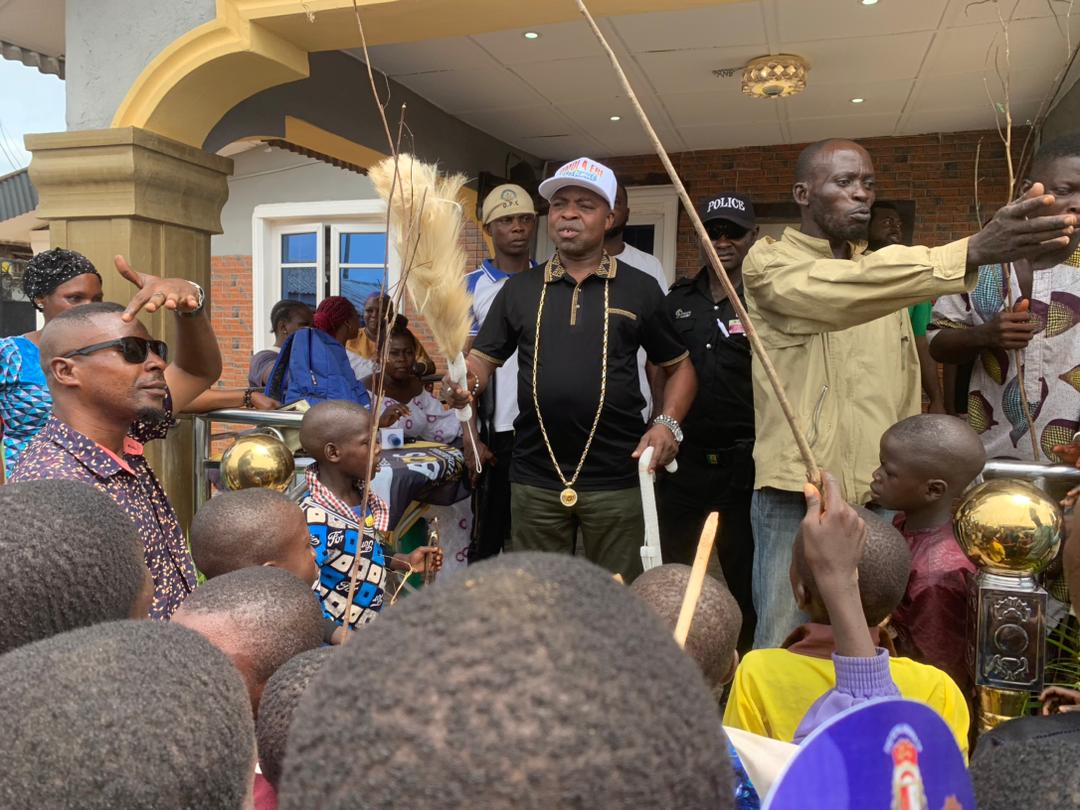 Omola of Odomola, Oba Adebowale Adesina celebrating the Eebi Kilajolu Festival with cane-wielding indigenes in Odomola