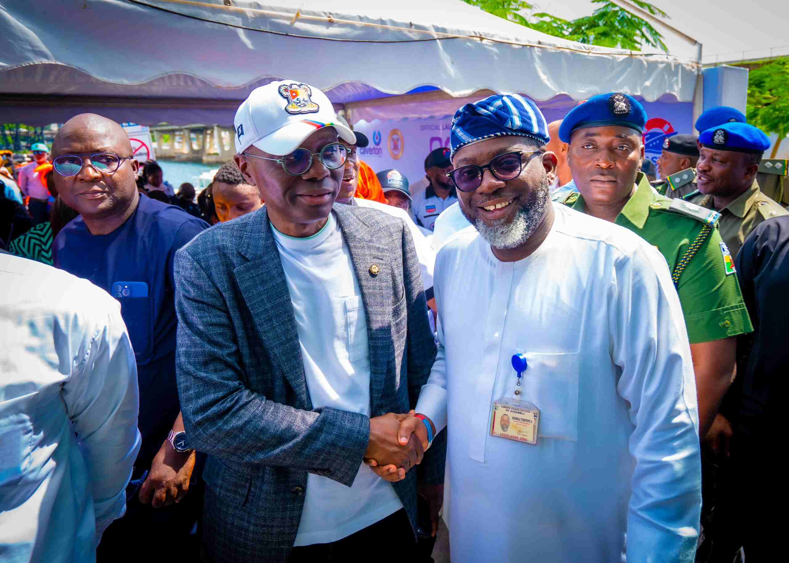 Lagos State Governor, Babajide Sanwo-Olu and Hon. Adewale Adedeji of Ifako-Ijaiye Constituency 01 exchanging pleasantries at the launch of 15 new locally manufactured boats