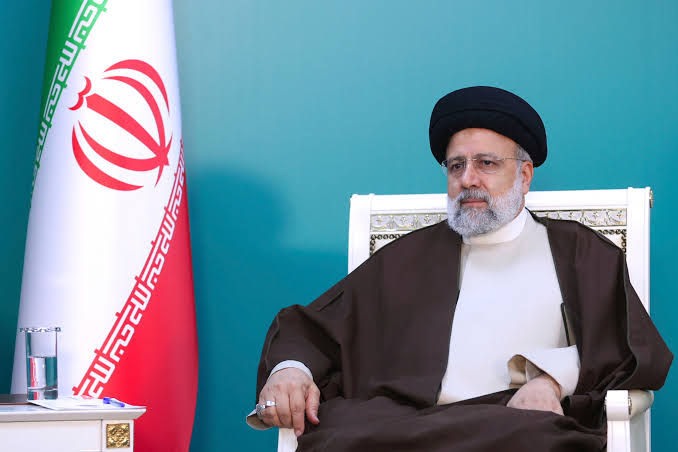 President Ebrahim Raisi attends a meeting during the inauguration ceremony of dam of Qiz Qalasi, or Castel of Girl in Azeri, at the border of Iran and Azerbaijan, May 19, 2024. (Iranian Presidency Office via AP)