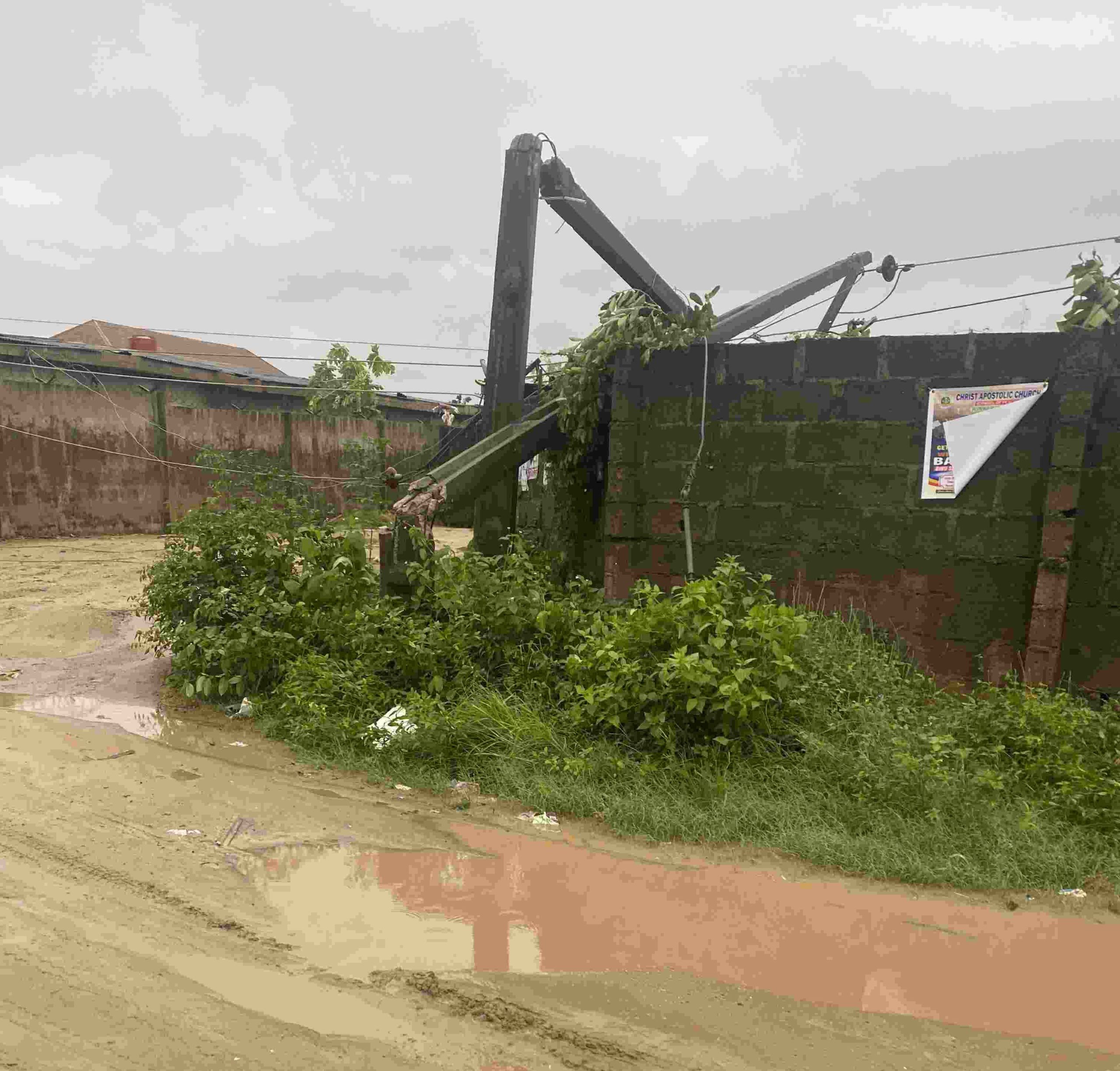 An electric pole fell by the heavy storm in Ibeshe, Ikorodu, Lagos