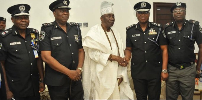 Oba Akiolu of Lagos exchanges pleasantries with DIG Sylvester Abiodun Alabi during a courtesy visit