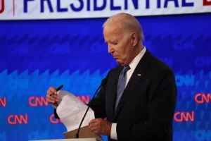 President Joe Biden flips through his notes during the debate in Atlanta. Austin Steele/CNN