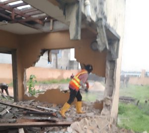 Lagos enforcement officials removing structures along Owode-Agiliti Drainage Channel, Kosofe, to prevent flooding