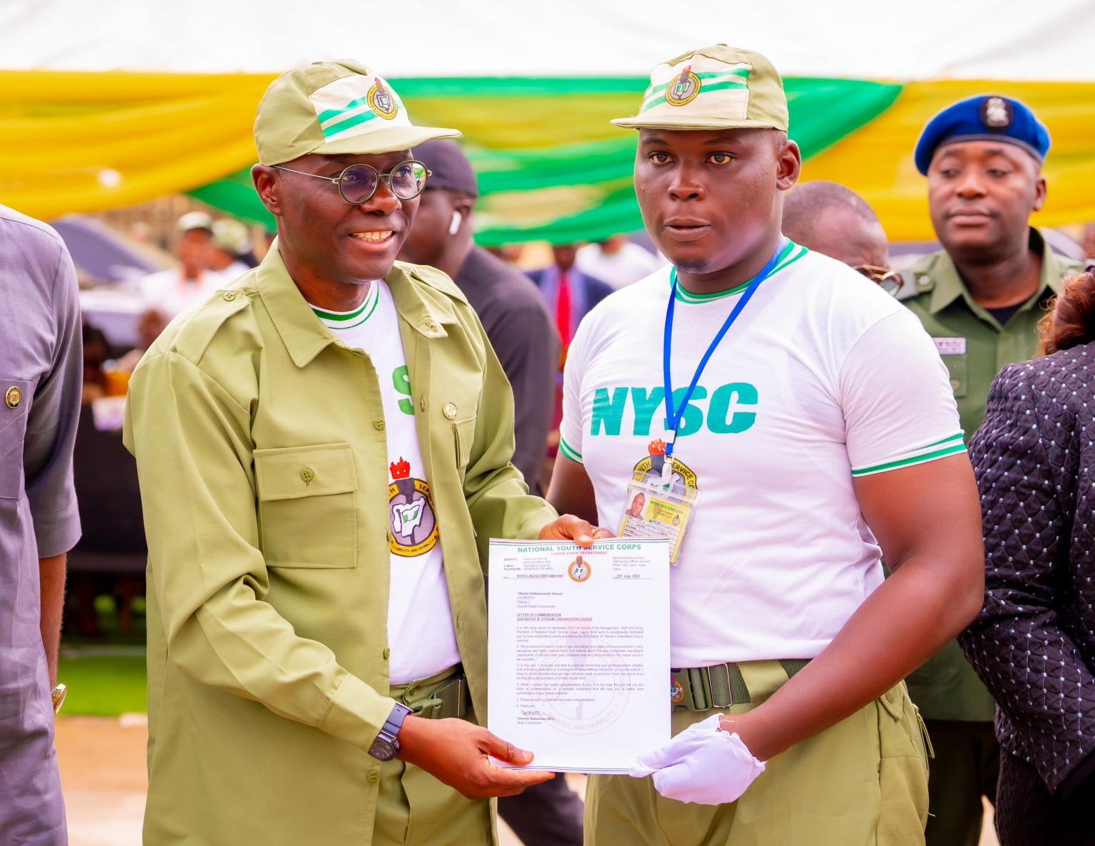 Lagos State Governor Babajide Sanwo-Olu with NYSC member