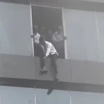 Workers at Afriland Towers jumping out of the building amid the fire incident on Tuesday, September 16, 2025