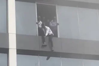 Workers at Afriland Towers jumping out of the building amid the fire incident on Tuesday, September 16, 2025