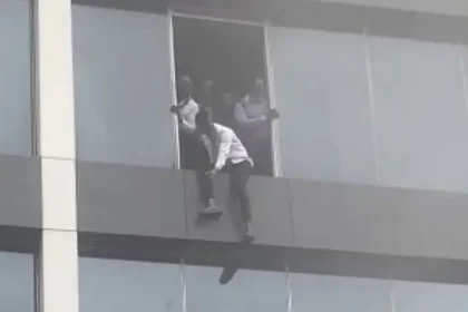 Workers at Afriland Towers jumping out of the building amid the fire incident on Tuesday, September 16, 2025