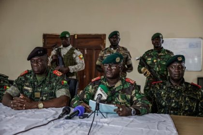 Brigadier General Denis N'Canha (Middle), head of the military office of the presidency gives a press conference at the General Staff of the Armed Forces on November 26, 2025. (Photo: MEINHARDT / AFP)
