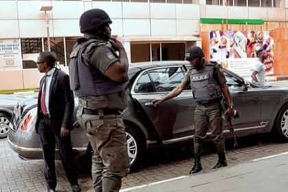 File photo of police orderlies tending to a VIP